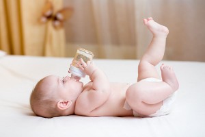 baby drinking water from bottle
